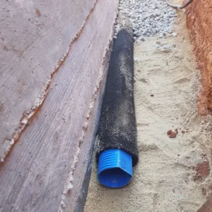 Drain périphérique et graviers pour l’étanchéité d’un bunker souterrain.
